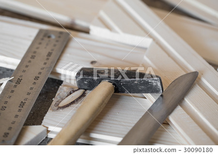 Hammer, knife, ruler and tongue and groove boards Hammer, knife, ruler and tongue and groove boards 30090180