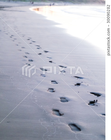 Footprints on the beach Footprints on the beach 30090282