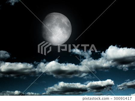 The moon in the night sky in clouds 30091417