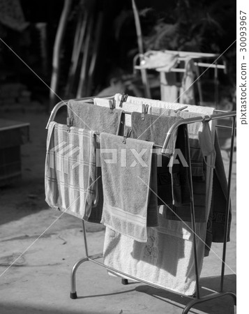 GROUP OF TOWELS UNDER SUNLIGHT 30093967