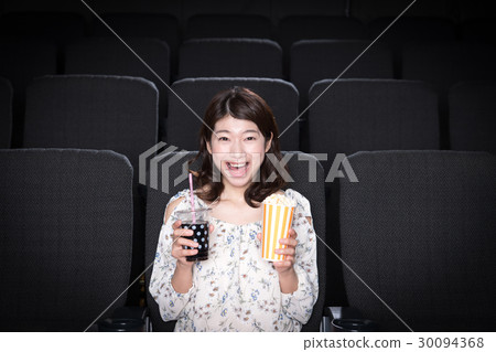 Young lady (movie theater) 30094368