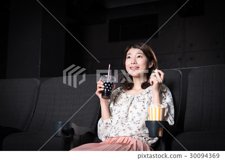 Young lady (movie theater) 30094369