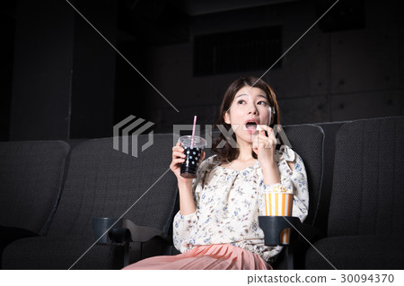 Young lady (movie theater) 30094370