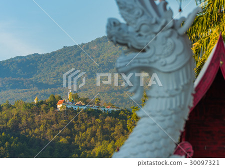 holy Buddha statue on mountain . 30097321