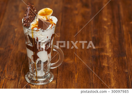 Ice cream chocolate cocktail in glass with syrup 30097985