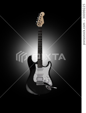 Black electric guitar on black background 30099225
