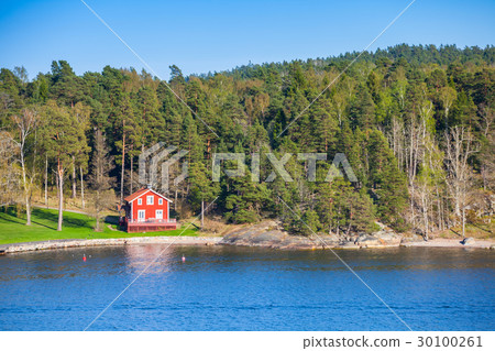 Coastal village with red wooden house Coastal village with red wooden house 30100261
