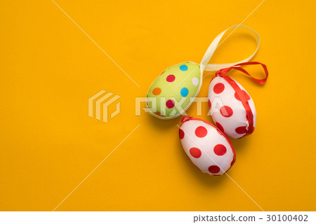 Colorful Easter eggs on a yellow background 30100402