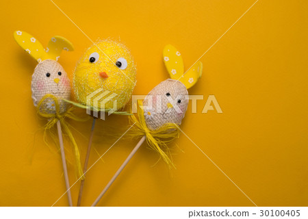 Colorful Easter eggs on a yellow background 30100405