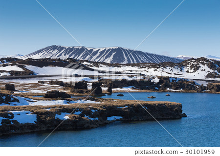 Myvatn volcano over blue lagoon Myvatn volcano over blue lagoon 30101959