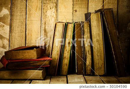 Old books on the wooden background. Old books on the wooden background. 30104590