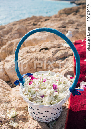 basket closeup with petals. wedding in cyprus basket closeup with petals. wedding in cyprus 30105099