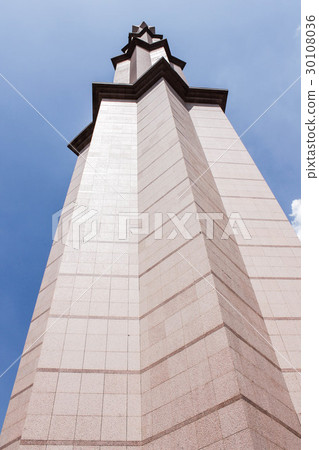 Bird eye view of one white pillar on blue sky Bird eye view of one white pillar on blue sky 30108036