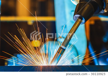 Close up robot welding in factory 30110923