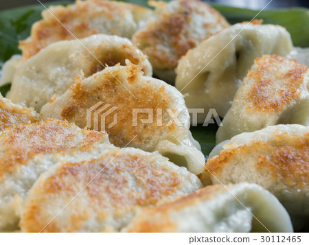 FRIED DUMPLINGS FILLED WITH MINCED CHICKEN FRIED DUMPLINGS FILLED WITH MINCED CHICKEN 30112465