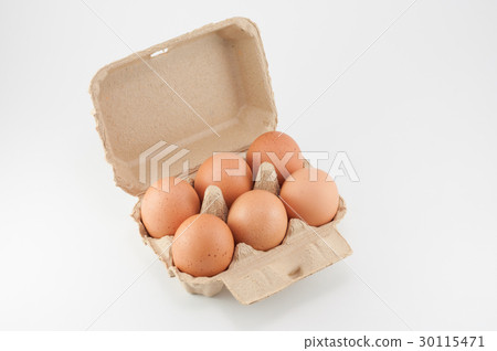 Egg box - eggs in an egg carton on white Egg box - eggs in an egg carton on white 30115471