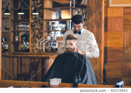 Young Man in Barbershop Hair Care Service Concept Young Man in Barbershop Hair Care Service Concept 30115641