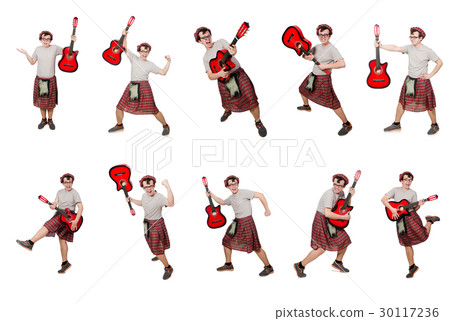 The scotsman playing guitar isolated on white The scotsman playing guitar isolated on white 30117236