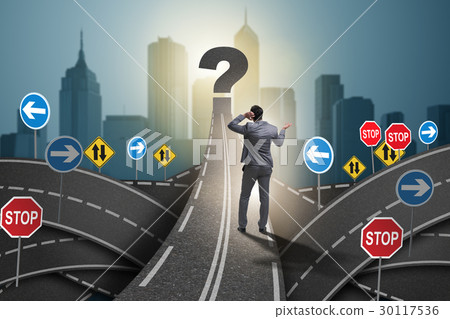 Businessman in uncertainty concept on road Businessman in uncertainty concept on road 30117536