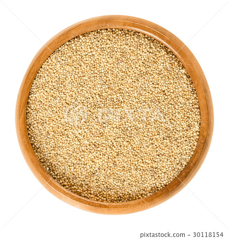 Amaranth grain in wooden bowl over white 30118154