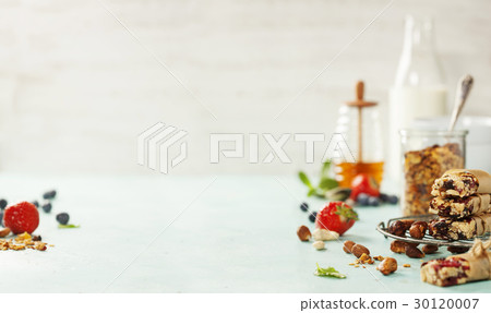 Granola bar on a blue rustic table 30120007