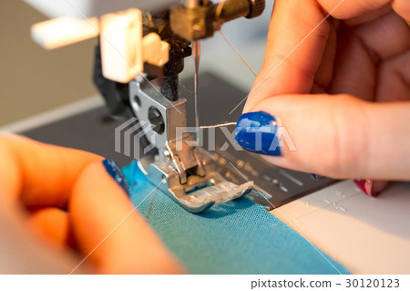 needlework and hand quilting in the workshop of a needlework and hand quilting in the workshop of a 30120123
