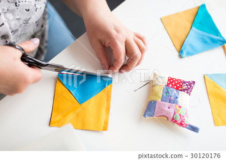 patchwork and quilting in the workshop of tailor 30120176