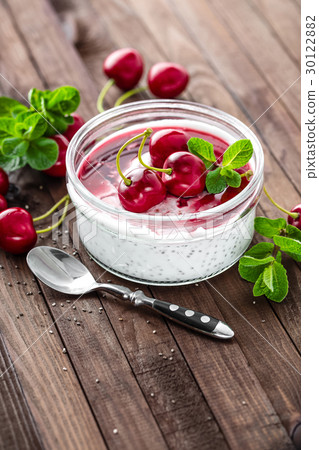 Fresh yogurt with cherry and chia seeds Fresh yogurt with cherry and chia seeds 30122882