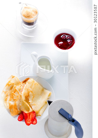 Crepes with strawberries and coffee Crepes with strawberries and coffee 30123587