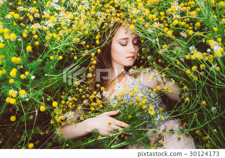 Portrait of young girl with closed eyes in field Portrait of young girl with closed eyes in field 30124173