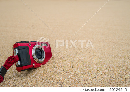 Camera on the beach Camera on the beach 30124343
