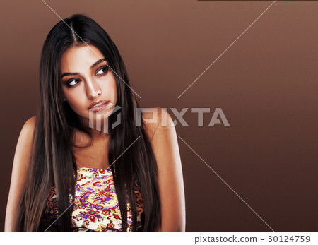 cute happy young indian woman in studio close up 30124759