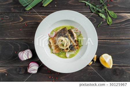carp fillet with cream of celery and lemon sauce carp fillet with cream of celery and lemon sauce 30125967