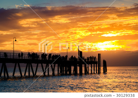 People walking along pier at Glenelg People walking along pier at Glenelg 30129338