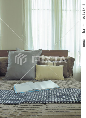 Magazine on bed in japanese style bedroom Magazine on bed in japanese style bedroom 30131211