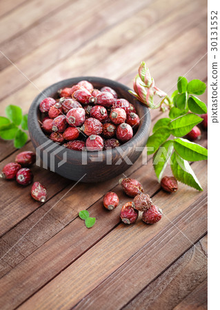 Dog rose or rosehip berries with leaves Dog rose or rosehip berries with leaves 30131552