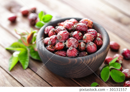 Dog rose or rosehip berries with leaves Dog rose or rosehip berries with leaves 30131557