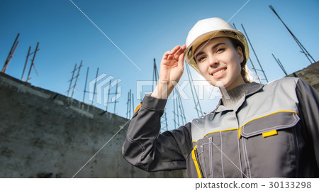 Female worker at a construction 30133298