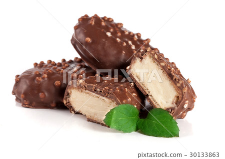 chocolate candy with nuts isolated on white chocolate candy with nuts isolated on white 30133863