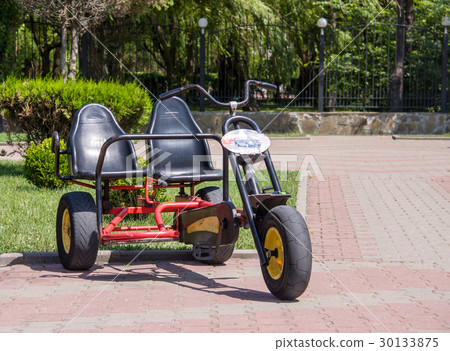 velomobile tourist standing in the park velomobile tourist standing in the park 30133875