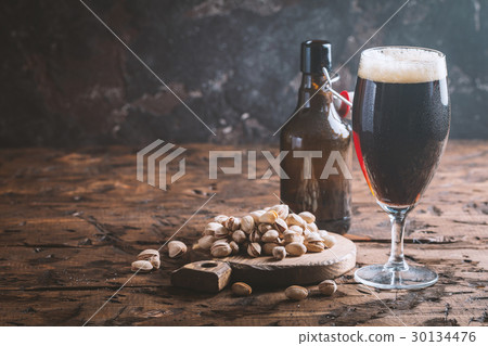 Glass of dark beer Glass of dark beer 30134476