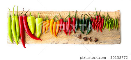 Group of colorful chili put on wooden  30138772
