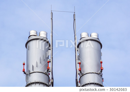 industrial boiler flues, against the blue sky industrial boiler flues, against the blue sky 30142083
