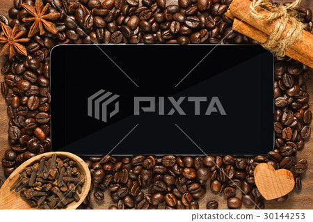 Tablet with frame of coffee beans and condiments Tablet with frame of coffee beans and condiments 30144253