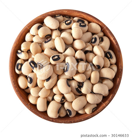 wooden bowl full of black eye beans isolated 30146633