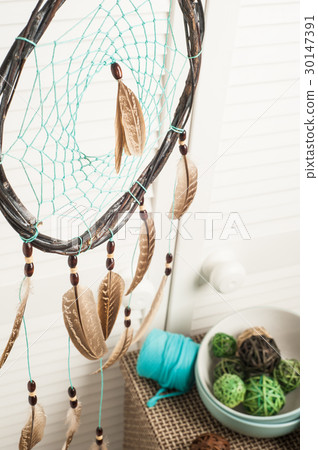 Dream catcher with brown feathers Dream catcher with brown feathers 30147391