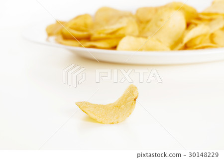 Crispy potato chips isolated on white background Crispy potato chips isolated on white background 30148229