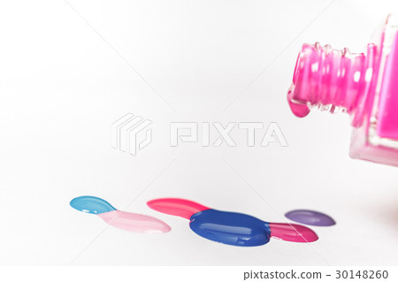 pink nail Polish and colorful drops isolated on 30148260