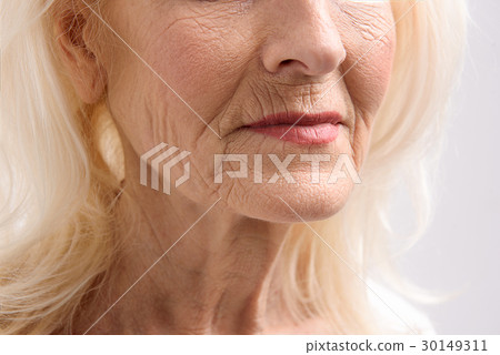 Mature female person with wrinkles 30149311