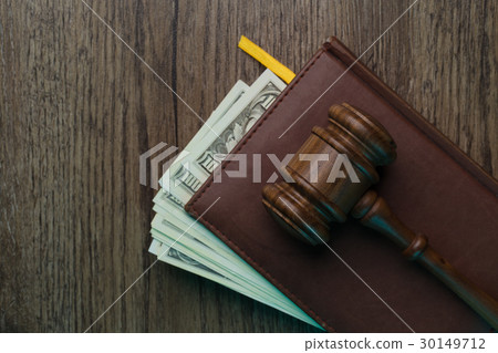 Judge's hammer, folder with banknotes 30149712